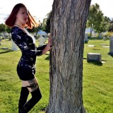 godsgirl model posing on a graveyard stone #5