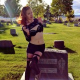 godsgirl model posing on a graveyard stone #4